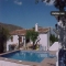 With a swimming pool