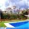 Swimming pool, barbeque, a short drive to the beach