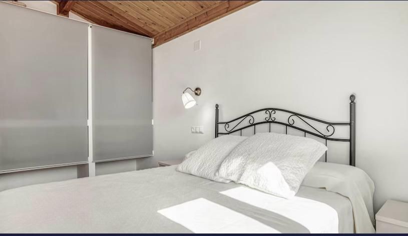 Dormitorio Casa Aguacate con piscina privada.