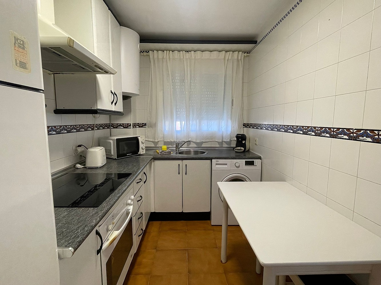 Apartamentos Cocina o zona de cocina