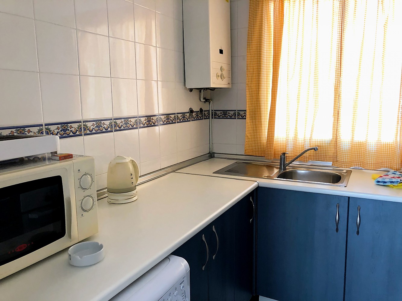 Apartamento vacacional con piscina comunitaria y wifi Cocina