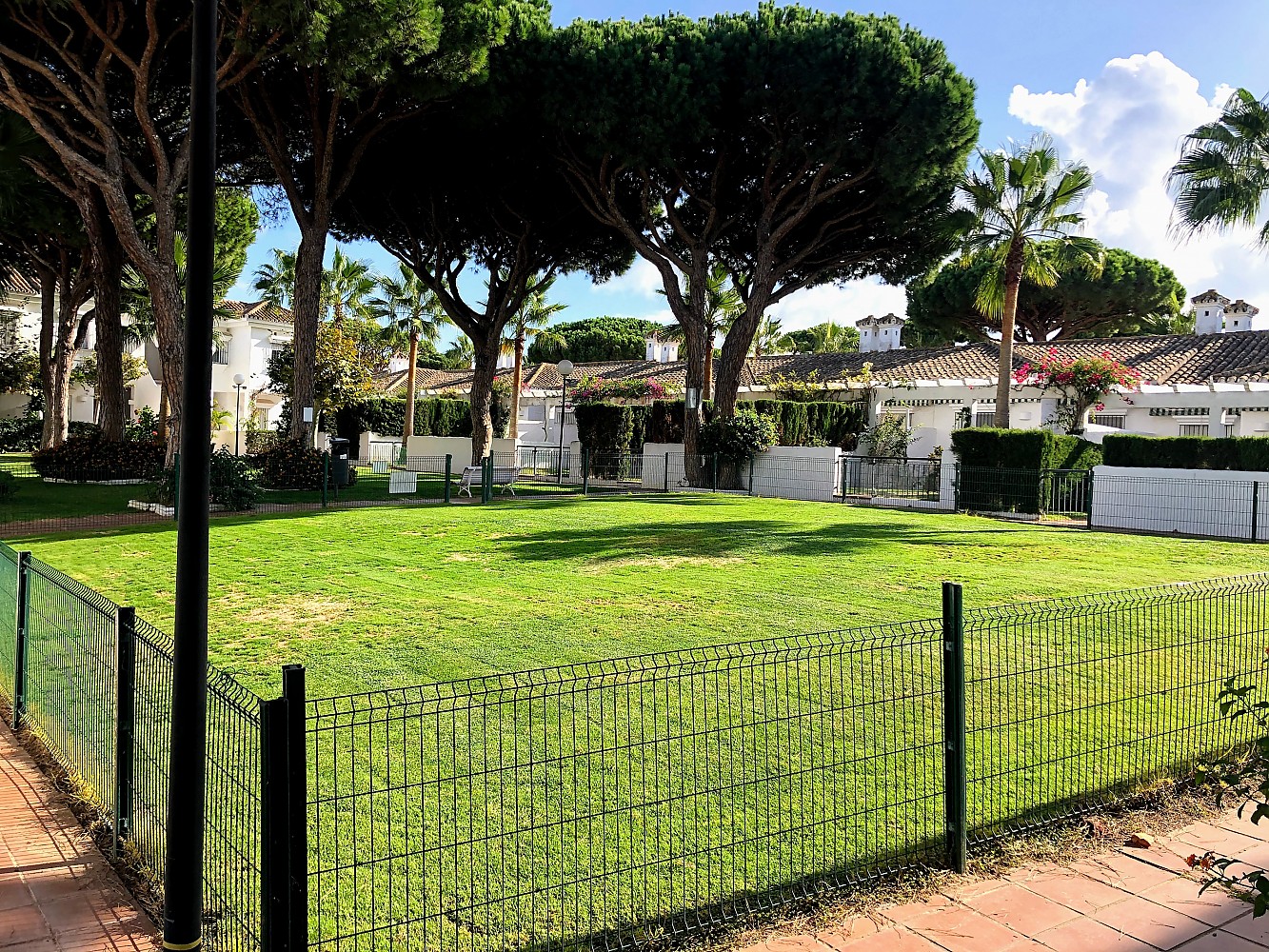 Jardín Apartamento vacacional con piscina comunitaria y wifi